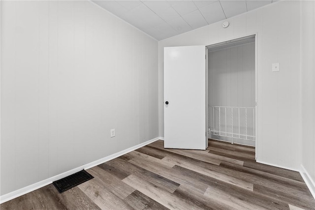 613-615 W Main St, Carnegie, PA 15106 - unfurnished bedroom with lofted ceiling and wood finished floors