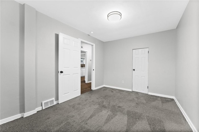 613-615 W Main St, Carnegie, PA 15106 - spare room featuring dark colored carpet and baseboards
