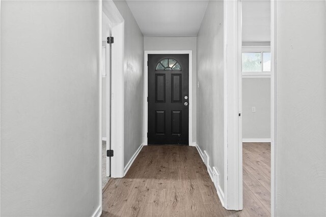 613-615 W Main St, Carnegie, PA 15106 - doorway to outside featuring light wood-type flooring and baseboards