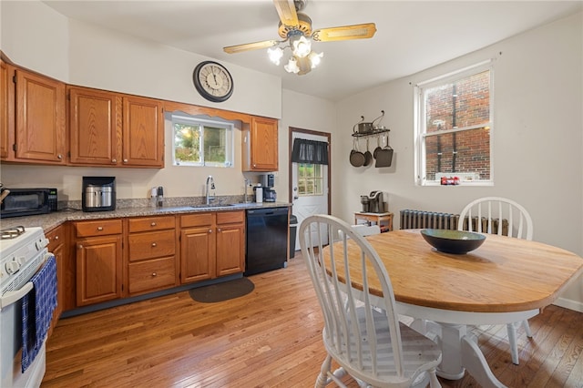 316 Kaercher St, Greenfield, PA 15207 - kitchen featuring black appliances, light wood finished floors, and brown cabinetry