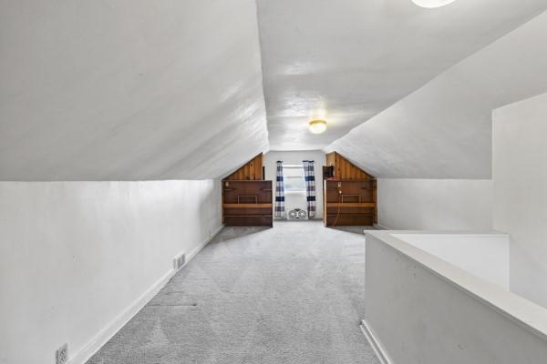 110 5th Ave, Ross Twp, PA 15229 - additional living space featuring lofted ceiling and light colored carpet