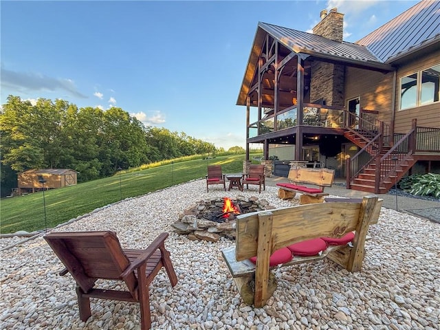 2780 Ipnar Rd, North Huntingdon, PA 15642 - view of patio / terrace with a fire pit, stairs, and a deck