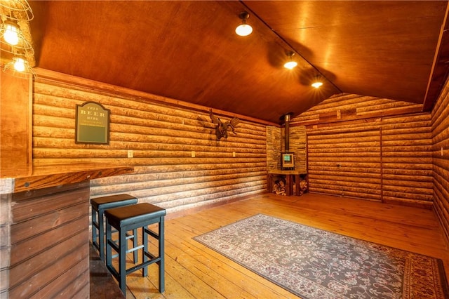 2780 Ipnar Rd, North Huntingdon, PA 15642 - living area with log walls, wooden ceiling, wood-type flooring, and vaulted ceiling