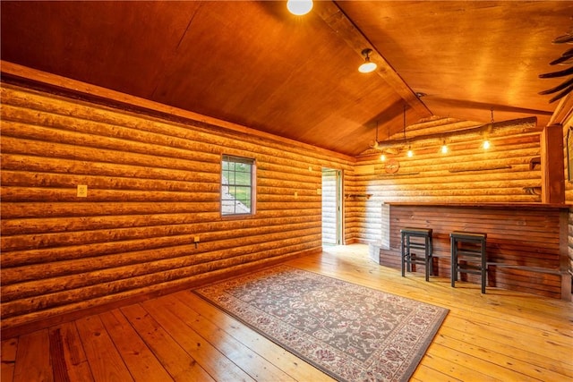 2780 Ipnar Rd, North Huntingdon, PA 15642 - living area with wood ceiling, rustic walls, and hardwood / wood-style flooring