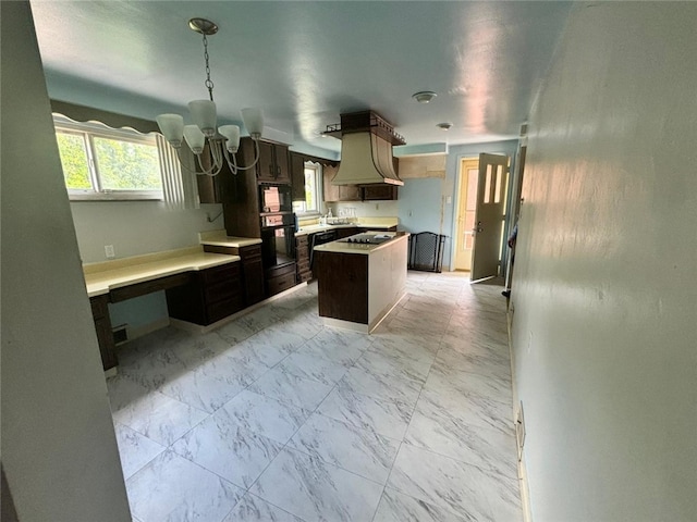 270 Wheeler Ave, Stowe Twp, PA 15136 - kitchen featuring light marble finish flooring, a center island, a chandelier, and custom exhaust hood
