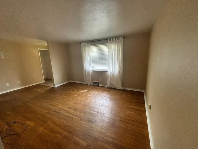 270 Wheeler Ave, Stowe Twp, PA 15136 - empty room featuring wood finished floors and baseboards