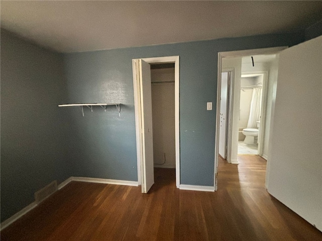 270 Wheeler Ave, Stowe Twp, PA 15136 - unfurnished bedroom featuring dark wood finished floors and a closet