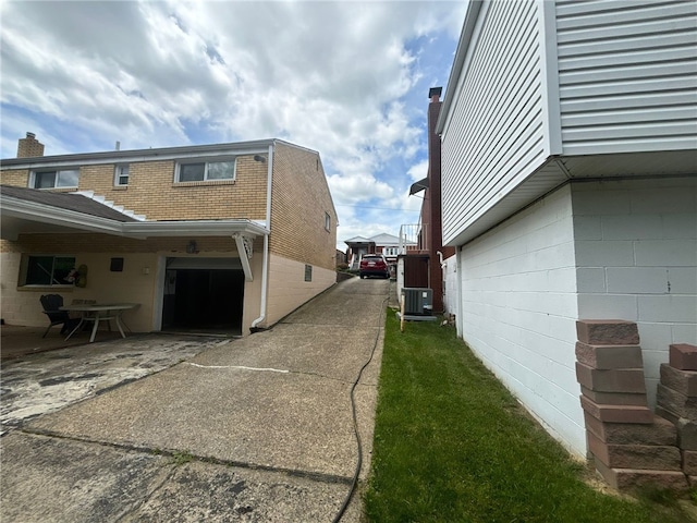 270 Wheeler Ave, Stowe Twp, PA 15136 - view of side of home featuring driveway and a garage