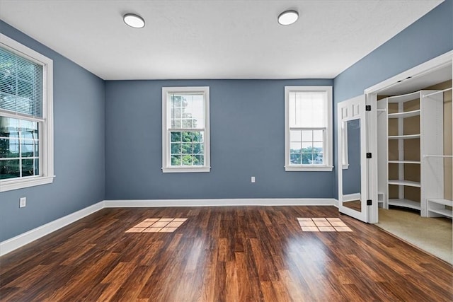 224 Bronx Ave, West View, PA 15229 - unfurnished bedroom featuring multiple windows and wood finished floors