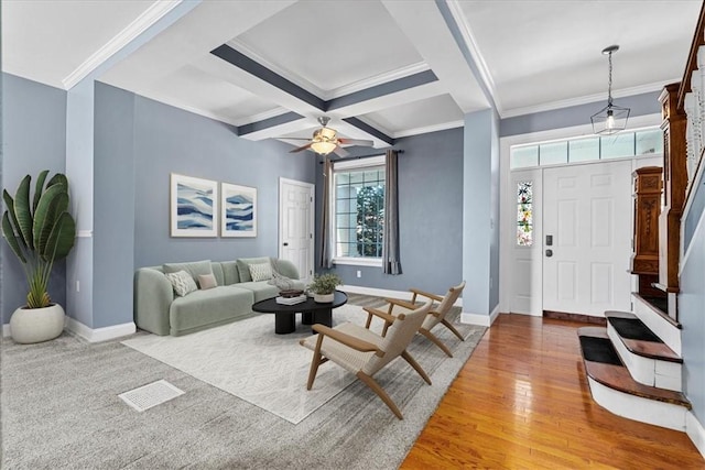 224 Bronx Ave, West View, PA 15229 - living area with crown molding, coffered ceiling, beamed ceiling, wood finished floors, and a ceiling fan