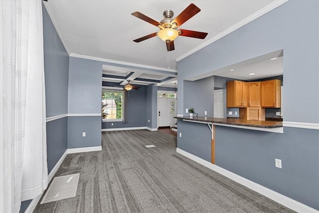 224 Bronx Ave, West View, PA 15229 - kitchen featuring ceiling fan, dark countertops, ornamental molding, brown cabinetry, and carpet