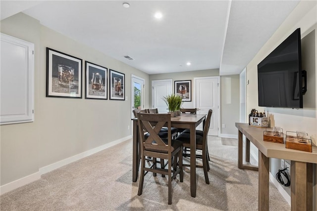 214 Hunter Dr, Moon/Crescent Twp, PA 15108 - dining space with light colored carpet and recessed lighting