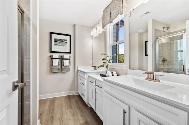 214 Hunter Dr, Moon/Crescent Twp, PA 15108 - full bath featuring vanity, a shower stall, and wood finished floors