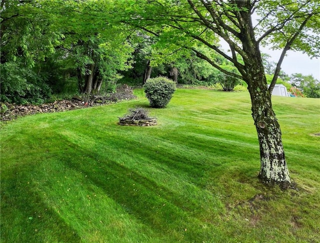 1605 Maratta Rd, Hopewell Twp, PA 15001 - view of green lawn with an outdoor fire pit