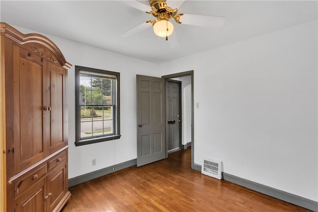 1255 Park Pl, Beaver, PA 15009 - unfurnished bedroom with wood finished floors and a ceiling fan
