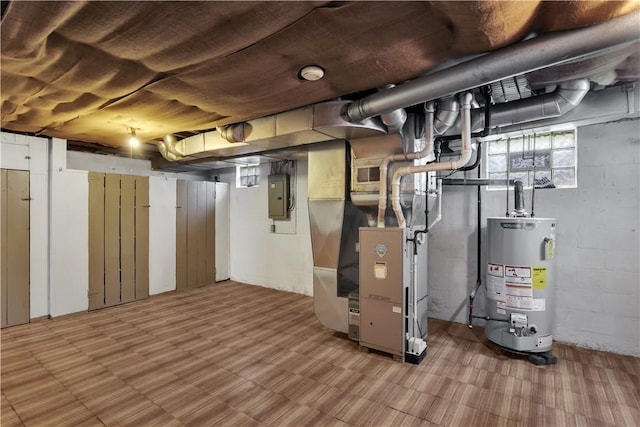 1255 Park Pl, Beaver, PA 15009 - basement with gas water heater, electric panel, and heating unit