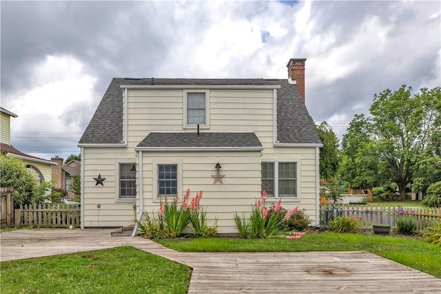 1255 Park Pl, Beaver, PA 15009 - back of house featuring a deck, a chimney, and roof with shingles