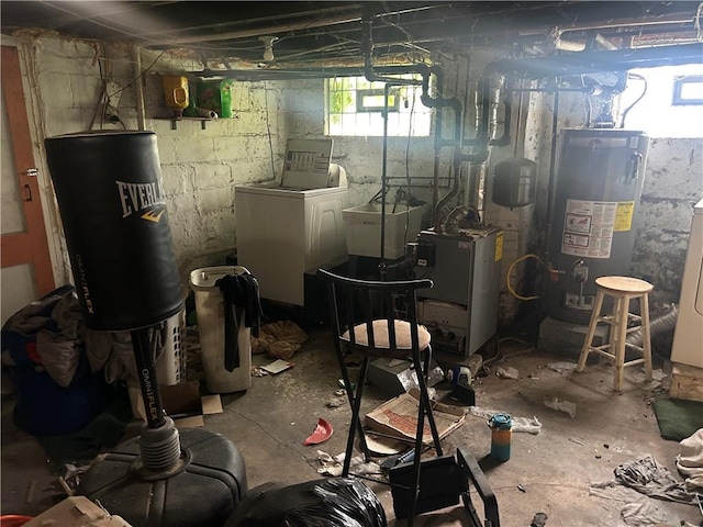 1175 New Salem Rd, Menallen Twp, PA 15468 - below grade area with gas water heater, washing machine and dryer, and a heating unit
