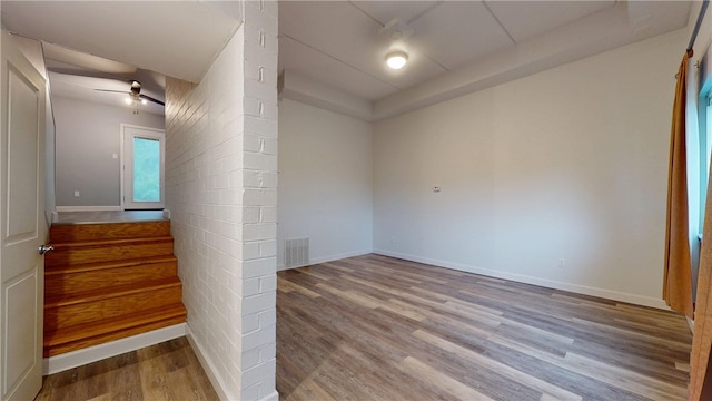 120 Rivermont Ct, Harmar, PA 15024 - empty room featuring wood finished floors, a ceiling fan, and decorative columns