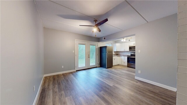 120 Rivermont Ct, Harmar, PA 15024 - unfurnished living room featuring a ceiling fan and light wood finished floors