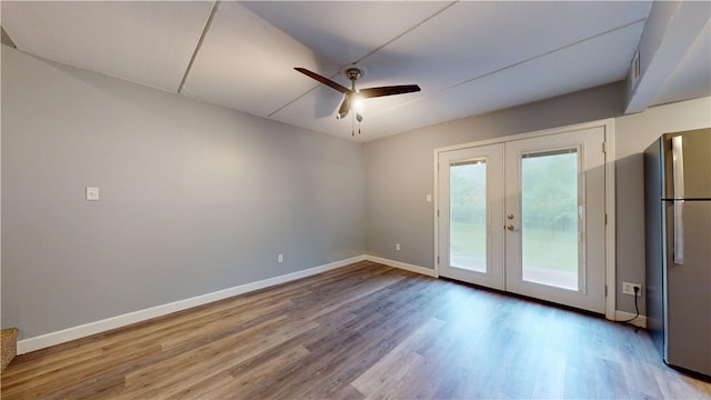 120 Rivermont Ct, Harmar, PA 15024 - spare room with ceiling fan, french doors, and wood finished floors