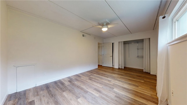 120 Rivermont Ct, Harmar, PA 15024 - unfurnished bedroom with wood finished floors, multiple closets, and a ceiling fan