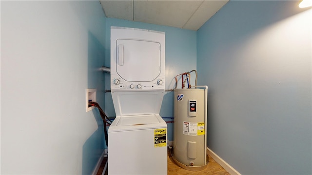 120 Rivermont Ct, Harmar, PA 15024 - laundry room featuring water heater and stacked washer and clothes dryer