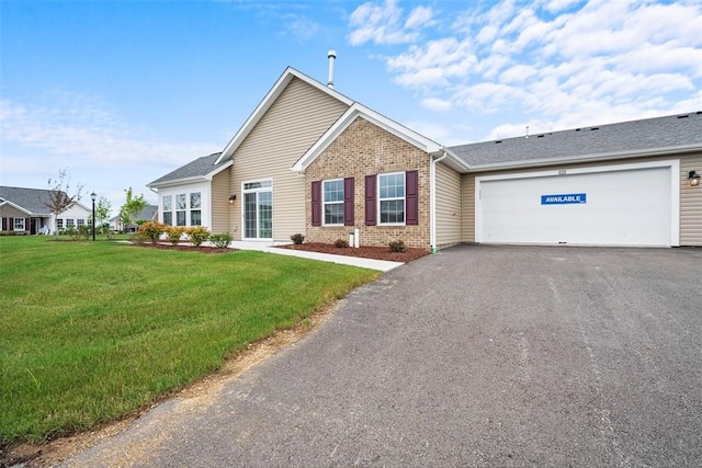 1082 Forest Oaks Dr, Center Twp, PA 16001 - ranch-style house featuring brick siding, driveway, a front yard, and a garage