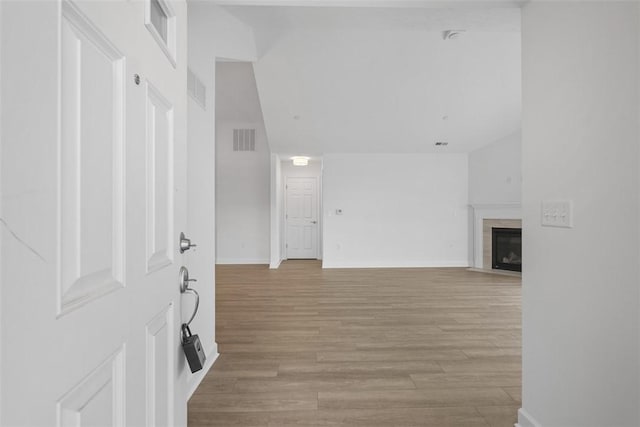 1082 Forest Oaks Dr, Center Twp, PA 16001 - entryway with light wood finished floors and a fireplace
