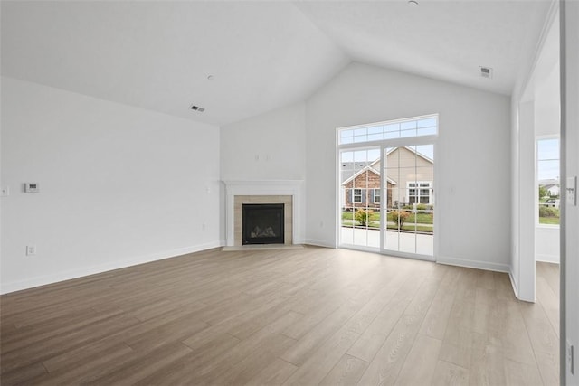 1082 Forest Oaks Dr, Center Twp, PA 16001 - unfurnished living room with plenty of natural light, wood finished floors, high vaulted ceiling, and a fireplace
