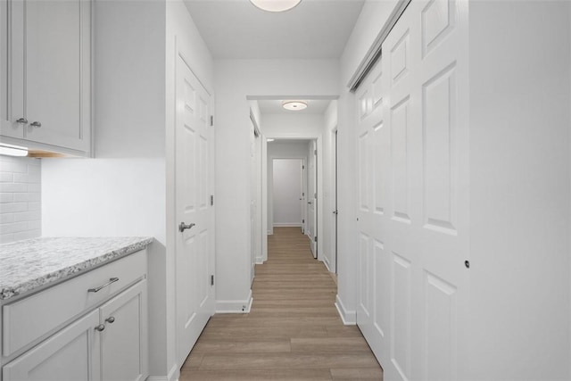 1082 Forest Oaks Dr, Center Twp, PA 16001 - hallway with light wood-type flooring and baseboards