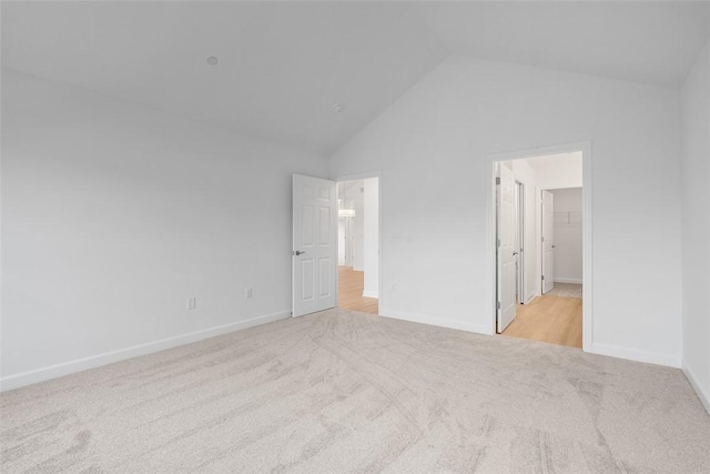 1082 Forest Oaks Dr, Center Twp, PA 16001 - unfurnished bedroom with carpet, a spacious closet, and high vaulted ceiling