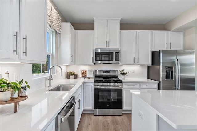 180 Elk Ridge Dr, Moon/Crescent Twp, PA 15108 - kitchen with appliances with stainless steel finishes, white cabinets, and light countertops