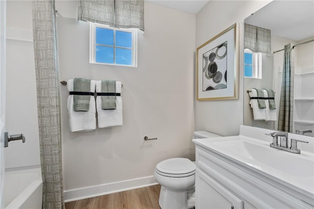 180 Elk Ridge Dr, Moon/Crescent Twp, PA 15108 - bathroom featuring wood finished floors, vanity, and shower / tub combo with curtain