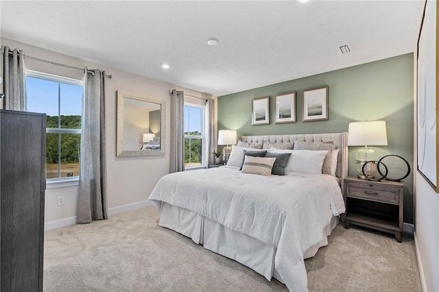 180 Elk Ridge Dr, Moon/Crescent Twp, PA 15108 - carpeted bedroom featuring multiple windows and recessed lighting