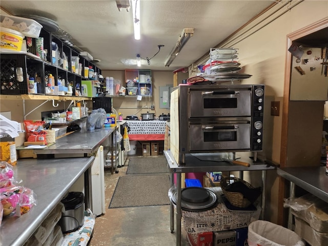 2879 Winslow Hill Rd, Benezette, PA 15821 - kitchen with concrete flooring, stainless steel countertops, and open shelves