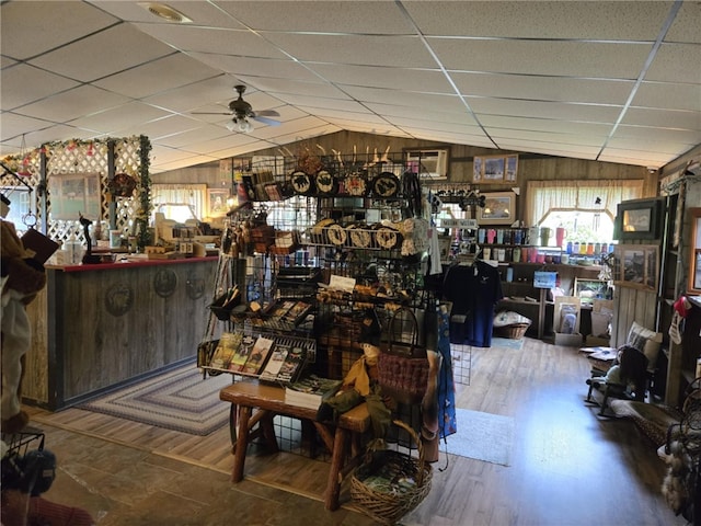 2879 Winslow Hill Rd, Benezette, PA 15821 - miscellaneous room featuring lofted ceiling, ceiling fan, wood walls, wood finished floors, and a drop ceiling