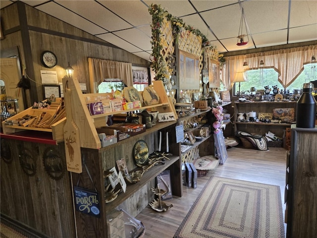 2879 Winslow Hill Rd, Benezette, PA 15821 - misc room with wooden walls, wood finished floors, lofted ceiling, and a drop ceiling
