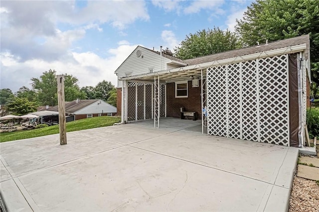 119 S Patton, Moon/Crescent Twp, PA 15108 - rear view of house with brick siding and roof with shingles