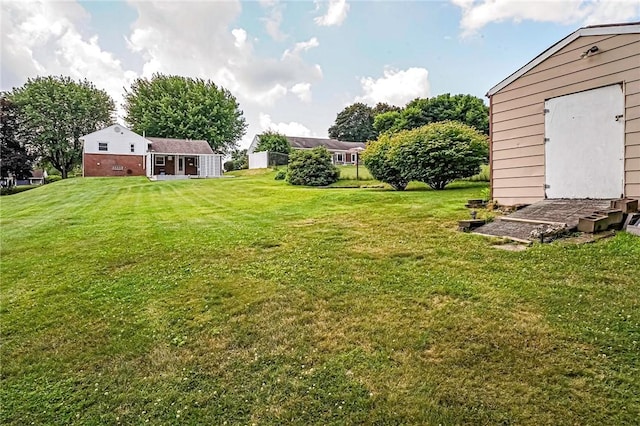119 S Patton, Moon/Crescent Twp, PA 15108 - view of grassy yard with a storage shed