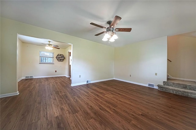 119 S Patton, Moon/Crescent Twp, PA 15108 - unfurnished living room featuring stairs, ceiling fan, and dark wood-style flooring