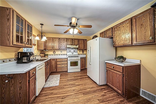 119 S Patton, Moon/Crescent Twp, PA 15108 - kitchen with white appliances, dark wood-style floors, under cabinet range hood, ceiling fan, and glass insert cabinets