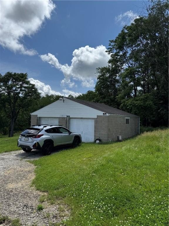 69 Beech St, Cecil, PA 15350 - view of side of property featuring a garage and a yard