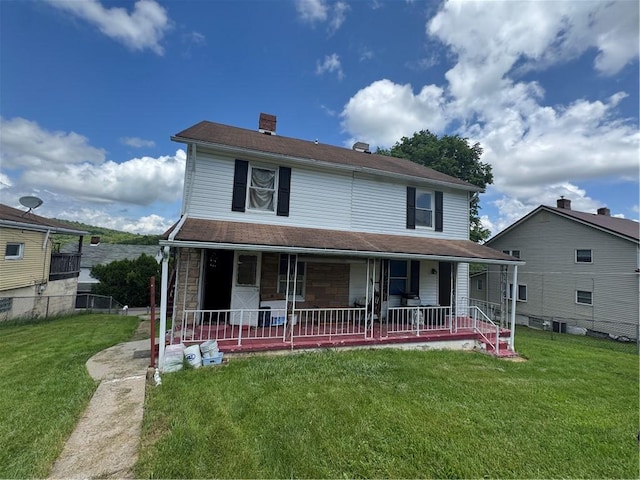 69 Beech St, Cecil, PA 15350 - view of front of property with a porch, a front lawn, and a chimney