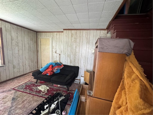 69 Beech St, Cecil, PA 15350 - sitting room with wood walls and carpet floors