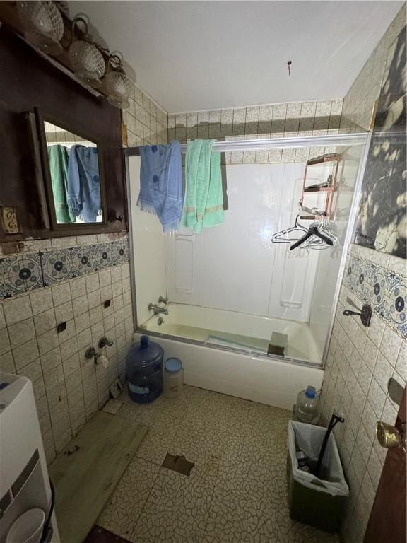 69 Beech St, Cecil, PA 15350 - bathroom with shower / bath combination, tile walls, and tile patterned floors