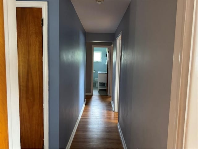118 Manchester Dr, Hempfield Twp, PA 15642 - corridor featuring dark wood-style flooring and baseboards
