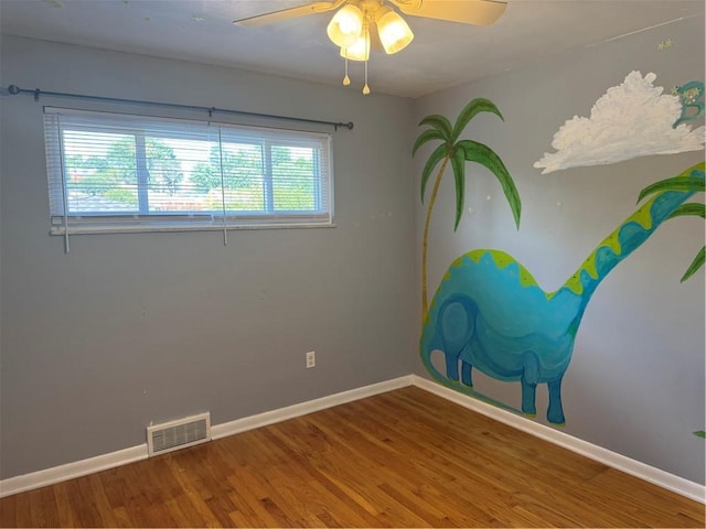 118 Manchester Dr, Hempfield Twp, PA 15642 - unfurnished room featuring wood finished floors and a ceiling fan