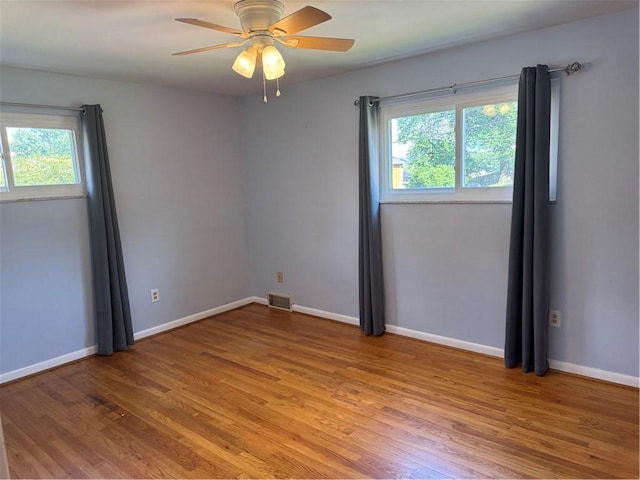 118 Manchester Dr, Hempfield Twp, PA 15642 - spare room with healthy amount of natural light, light wood-type flooring, and ceiling fan