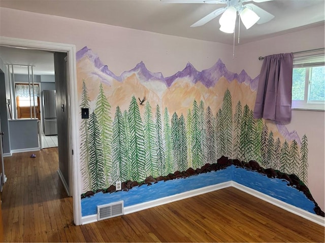 118 Manchester Dr, Hempfield Twp, PA 15642 - unfurnished room featuring hardwood / wood-style flooring, ceiling fan, and healthy amount of natural light
